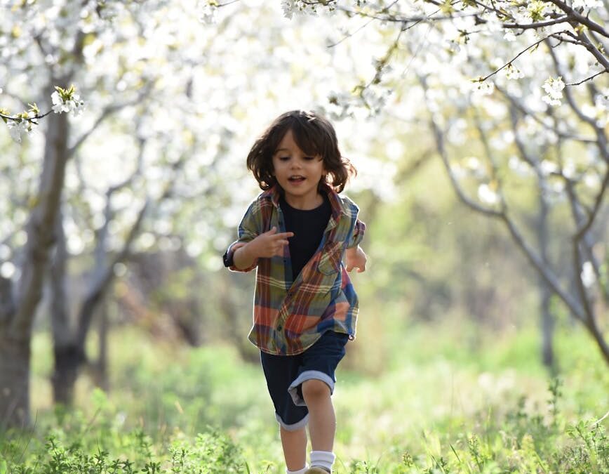 boy running during sunset